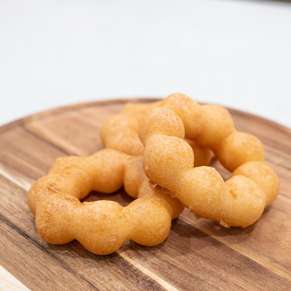 Mochi Donuts placed on a wooden tray  view 3
