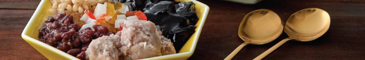 Assortment of topping placed in a bowl against brown background
