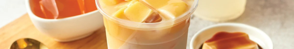 Top image of pudding placed as toppings in drink cups