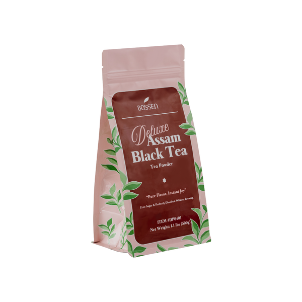 Tea package labeled 'Deluxe Assam Black Tea' by Bossen on a white background view 1