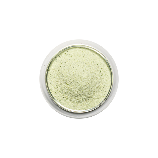 Pandan powder in a small round container on a white background view 2