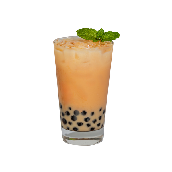 Glass of iced beverage with boba and a mint leaf on a white background view 4