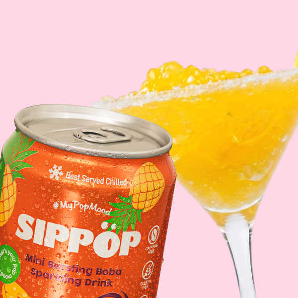 Sippop sparkling drink can with a glass of yellow shaved ice on a pink background view 5